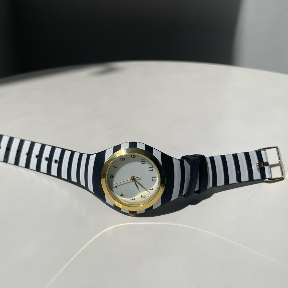 Black and White Stripped Watch with Gold Face